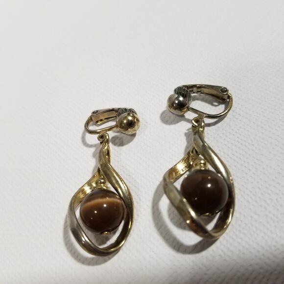 one inch clip on gold tone dangle brown cats eye earrings - Picture 9 of 9